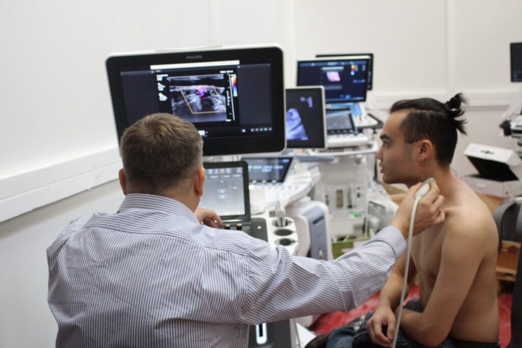 Even other resellers benefit from a partnership with DirectMed Imaging. Here's one testing an ultrasound for his customer, before selling.