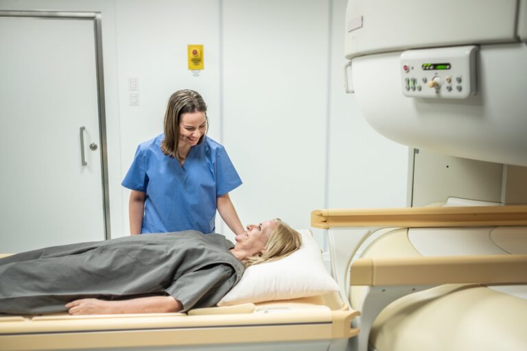 MRI Technologist talking to patient